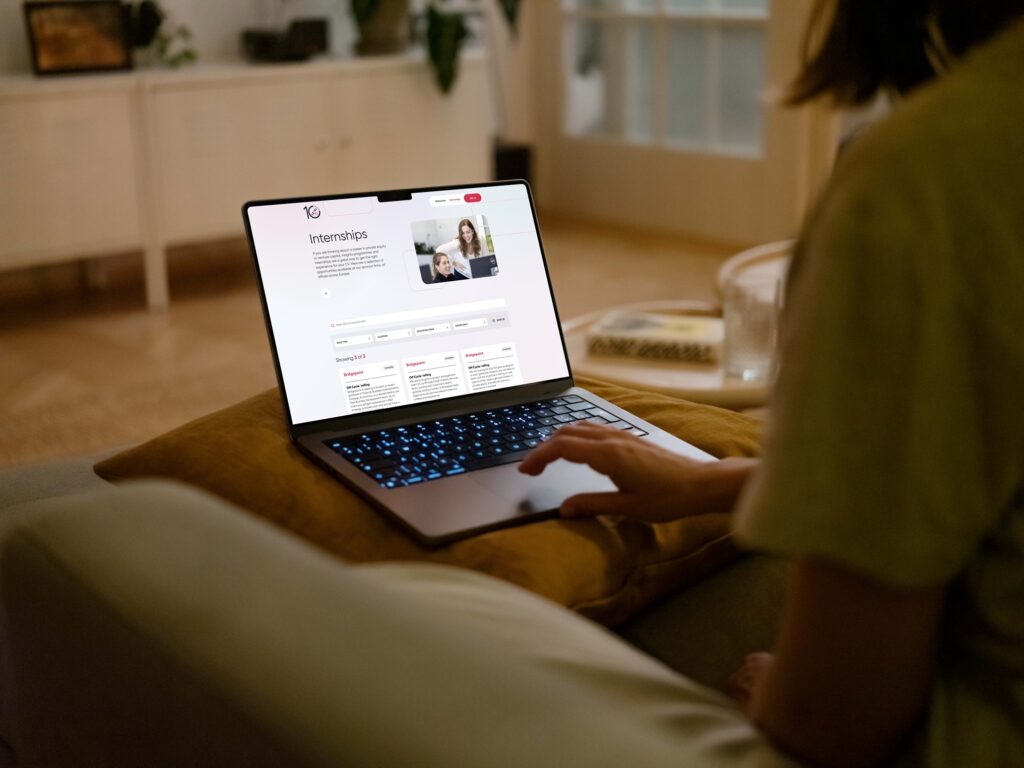 Mockuuups Woman Hand Working On Macbook Mockup (1)